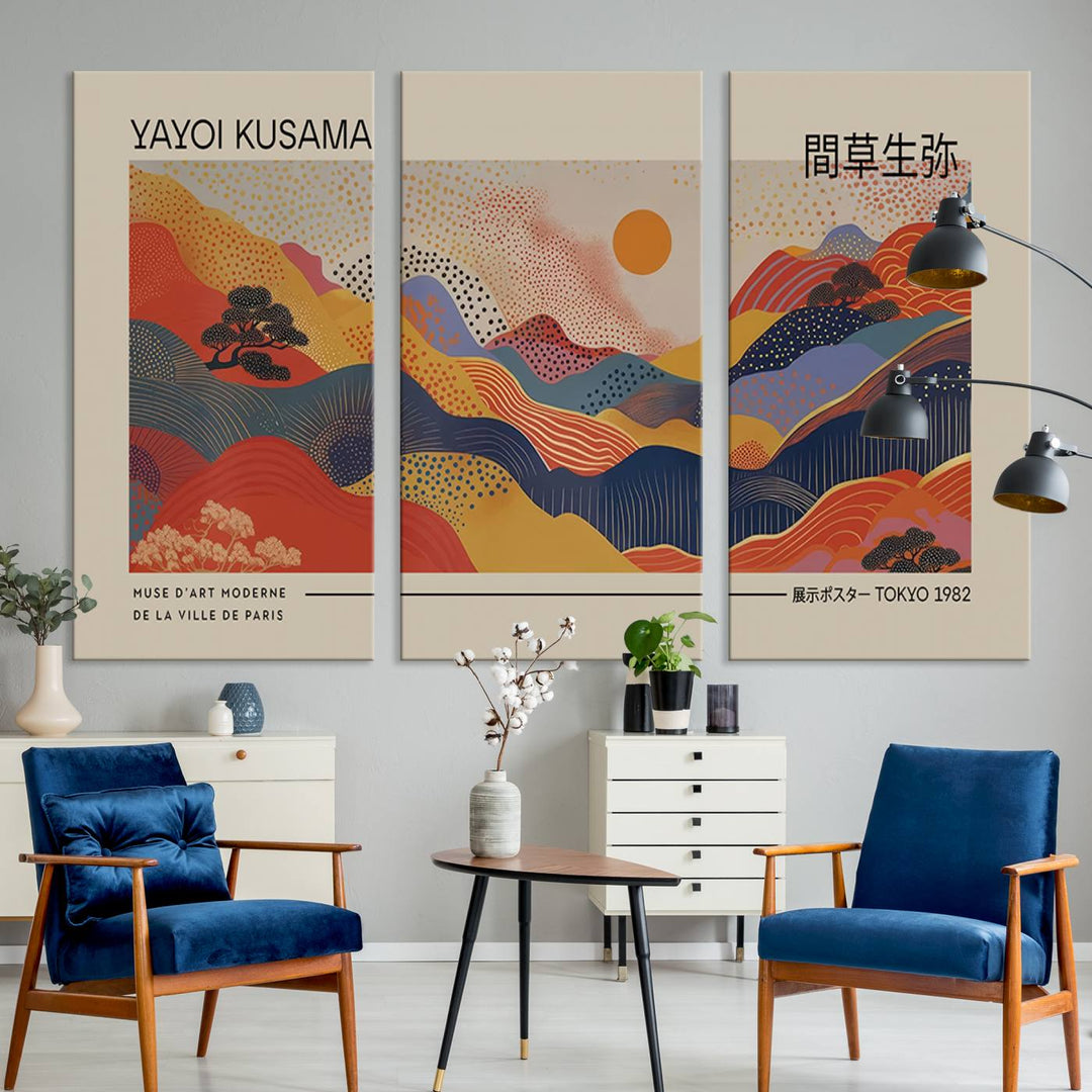 The Yayoi Kusama vibrant landscape canvas print featuring abstract mountains and a sun enhances the space with its modern aesthetic.