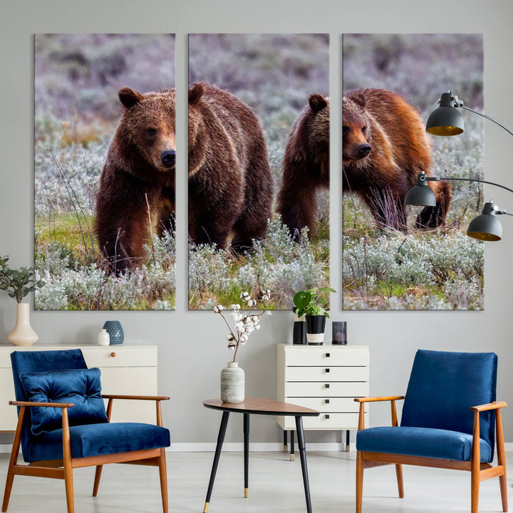 The "Queen of the Tetons" is a stunning canvas art print featuring Grizzly 399 and two bears strolling through a grassy field. Its gallery-quality finish beautifully captures the essence of nature, making it perfect for rustic home decor.