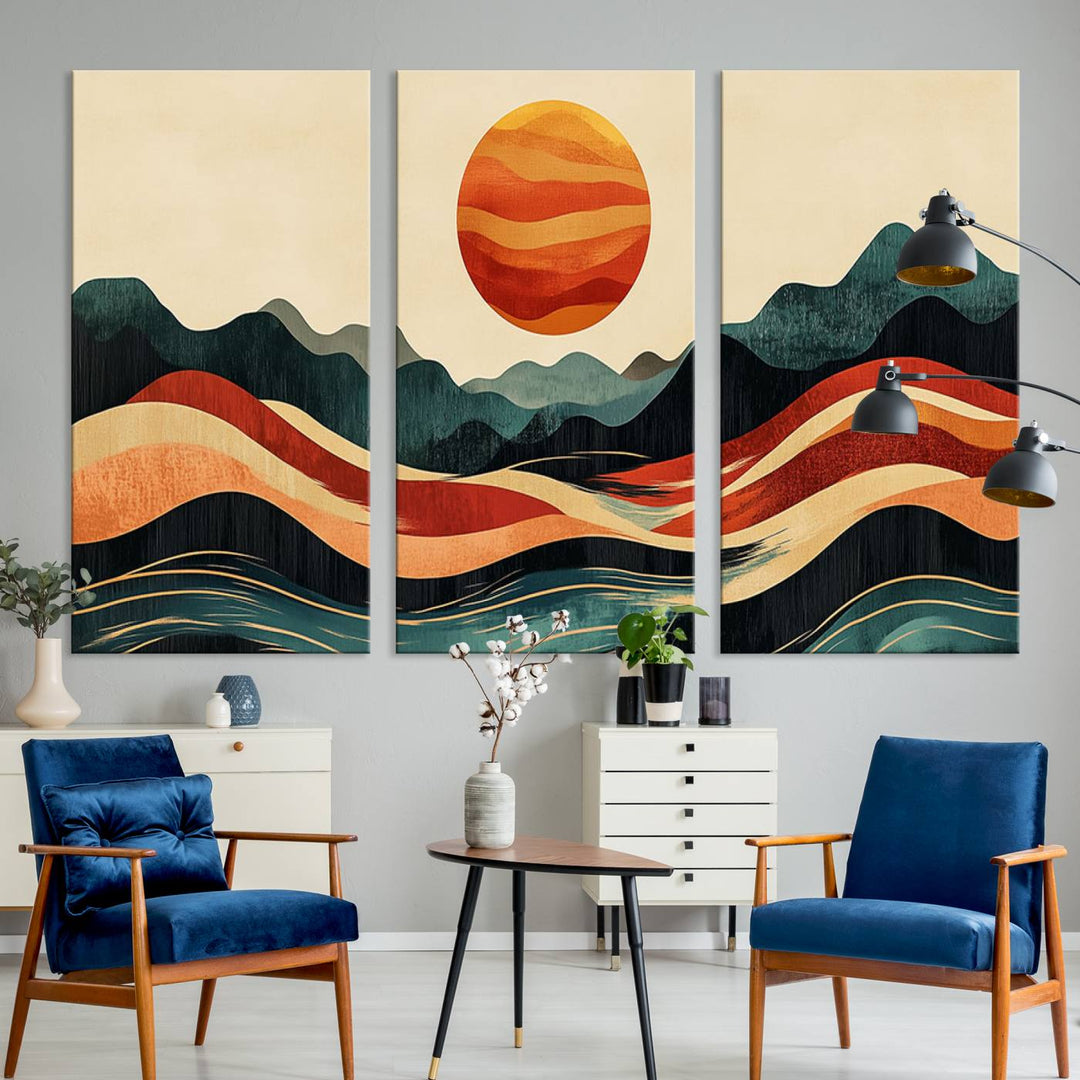 The Mountain Triptych wall art, featuring a design of the sun, mountains, and waves, is displayed prominently on the wall.