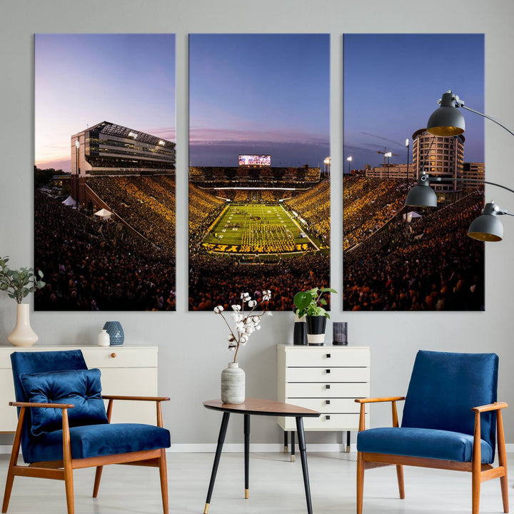 The Iowa Hawkeyes Kinnick Stadium Wall Art Canvas Print captures a sunset scene, making it perfect for display on a wall.