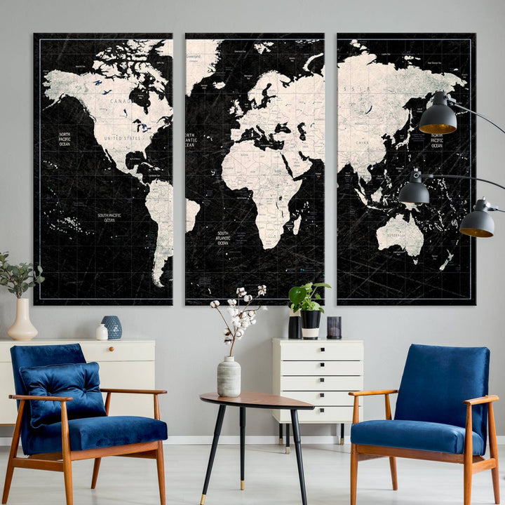 The Black & White World Map Canvas Wall Art, a giclee print, elegantly decorates the wall.