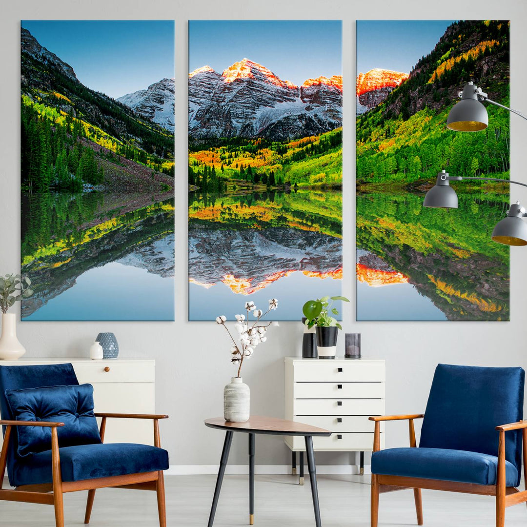 The Sunrise Maroon Bells Lake Wall Art Print beautifully captures North Maroon Peak mirrored in the tranquil lake, framed by lush greenery.