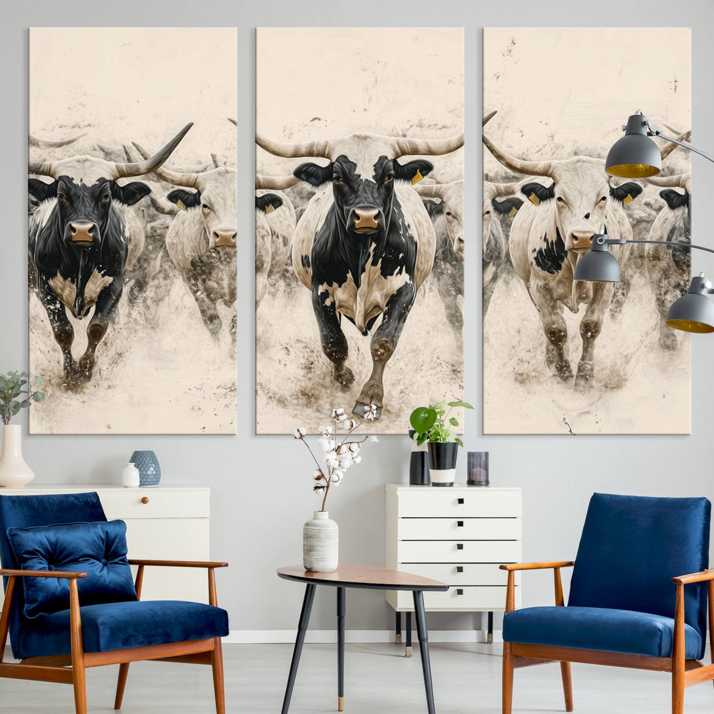 Canvas artwork of Texas Longhorn bulls walking in a dusty herd, ideal for rustic Western or country-style interior decor.
