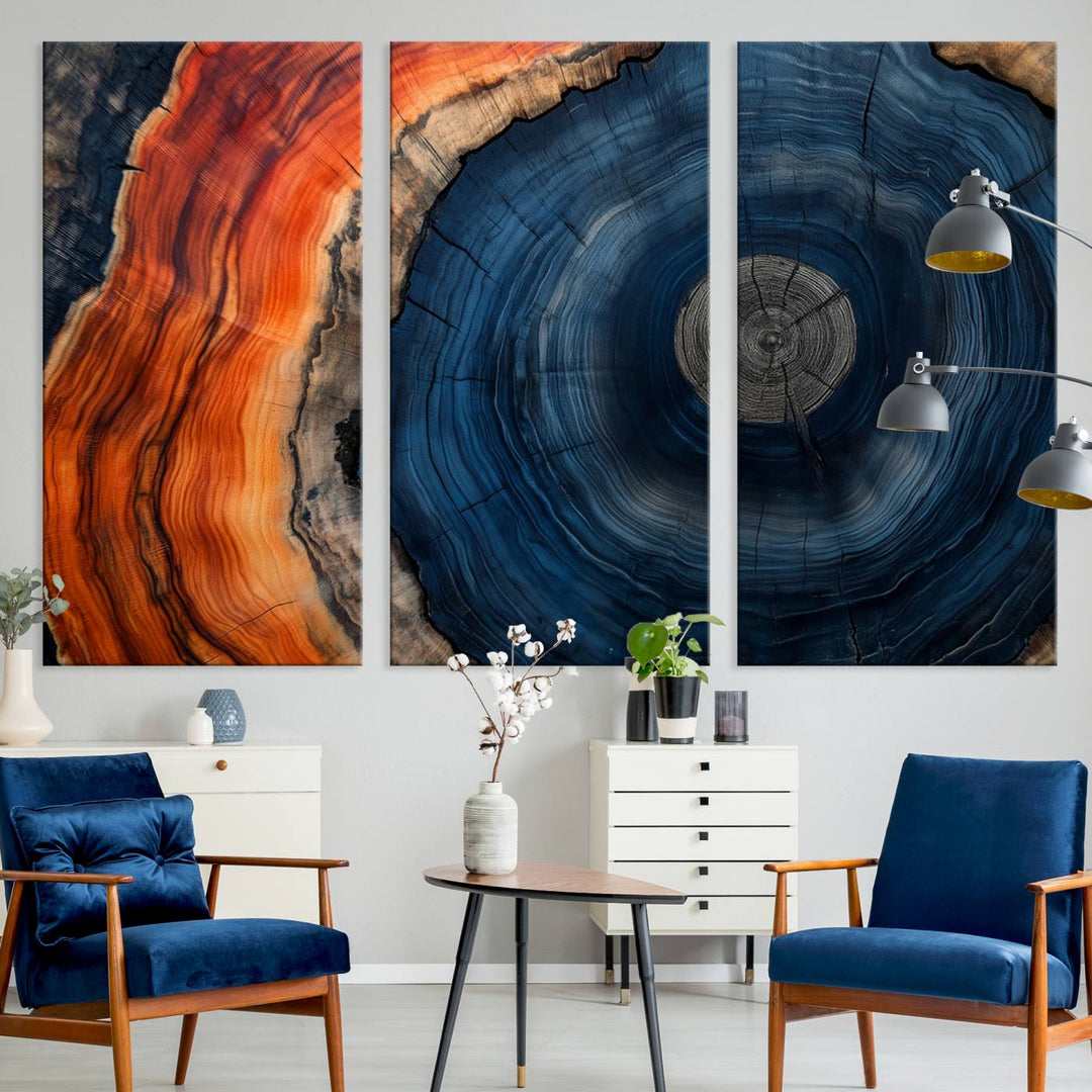 Abstract Tree Ring Wall Art Print on canvas featuring vibrant blue, orange, and brown rings with a natural rustic wood texture. Free shipping available!.