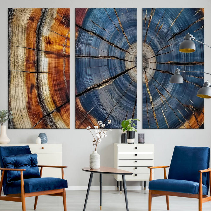 Close-up of blue, brown, and orange wood grain rings on the Abstract Tree Rings Canvas Wall Art Print.