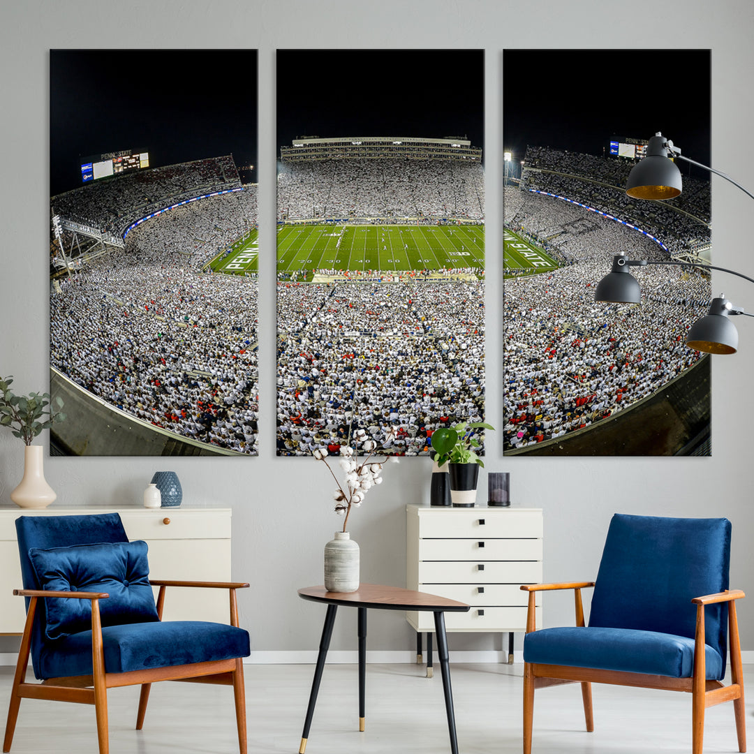 The Beaver Stadium Night Game Triple Canvas Wall Art - Penn State Nittany Lions Football Match features a panoramic view of a packed Beaver Stadium at night.