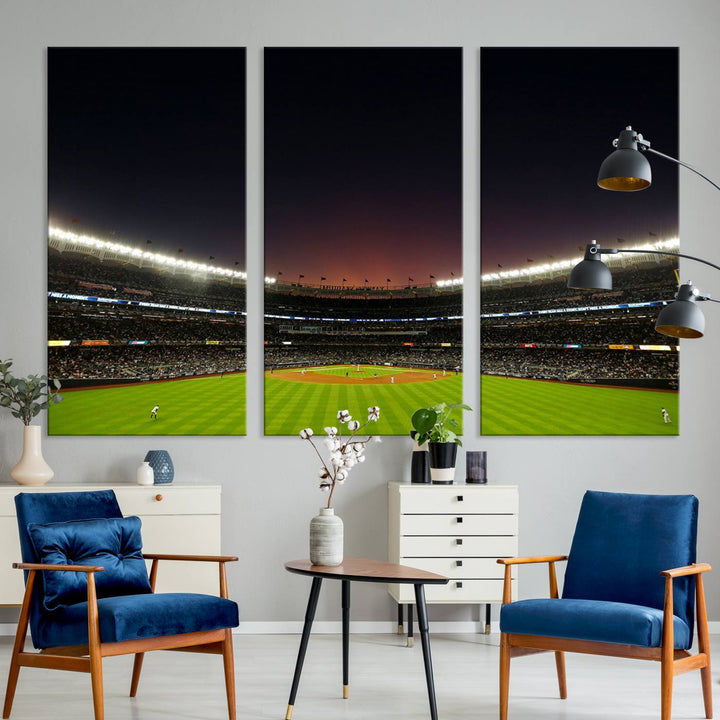 A night game at Yankee Stadium depicted on canvas beneath a sunset sky.