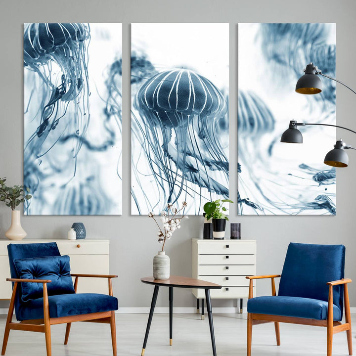 The "Abstract Jellyfish Wall Art Canvas Print" in high resolution is beautifully displayed as a triptych on a dark wall. Experience museum-quality canvas and enjoy free shipping with this stunning piece.