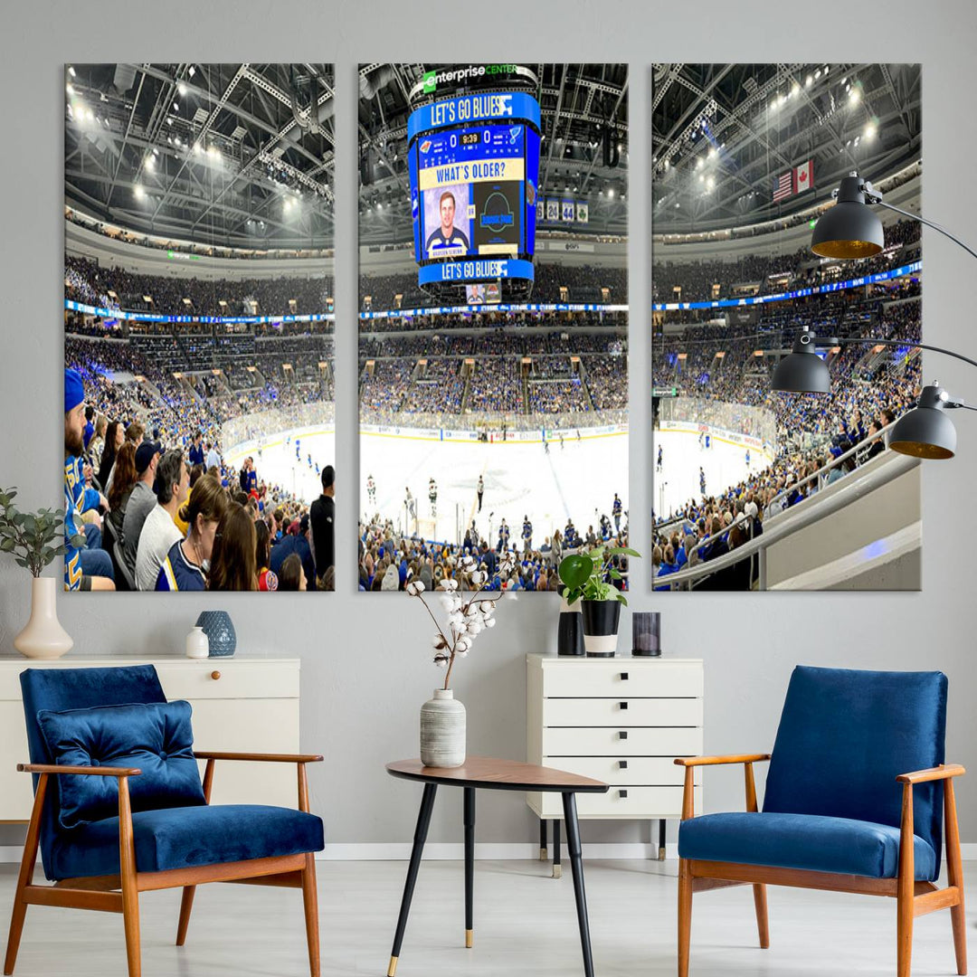 Wall art prints depicting the bustling scenes of the St. Louis Blues being cheered on by a full house at the Enterprise Center, beneath a large scoreboard.