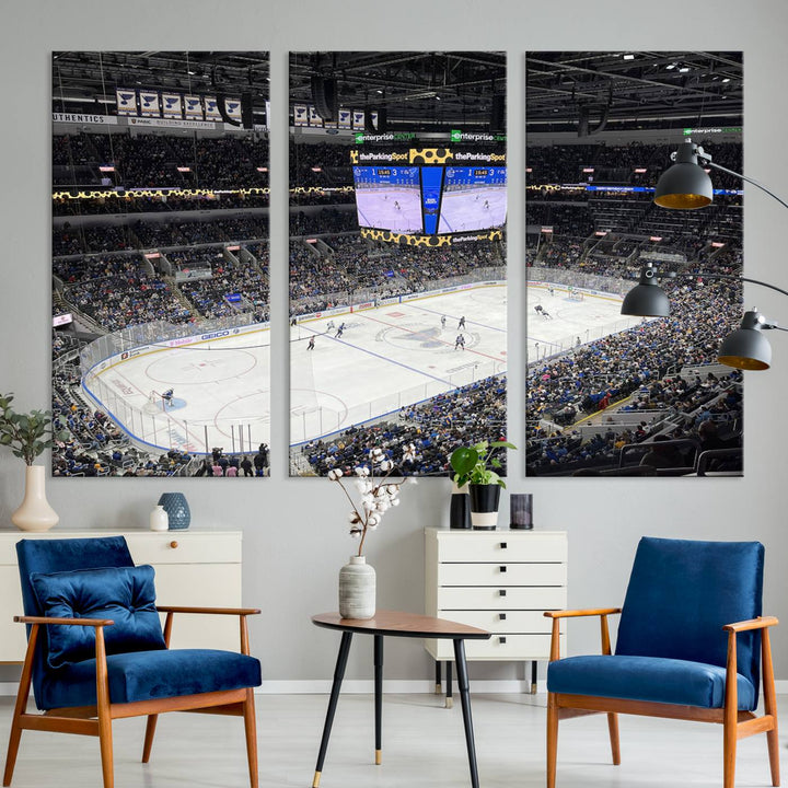 A large Enterprise Center canvas of a crowded hockey arena hangs prominently.