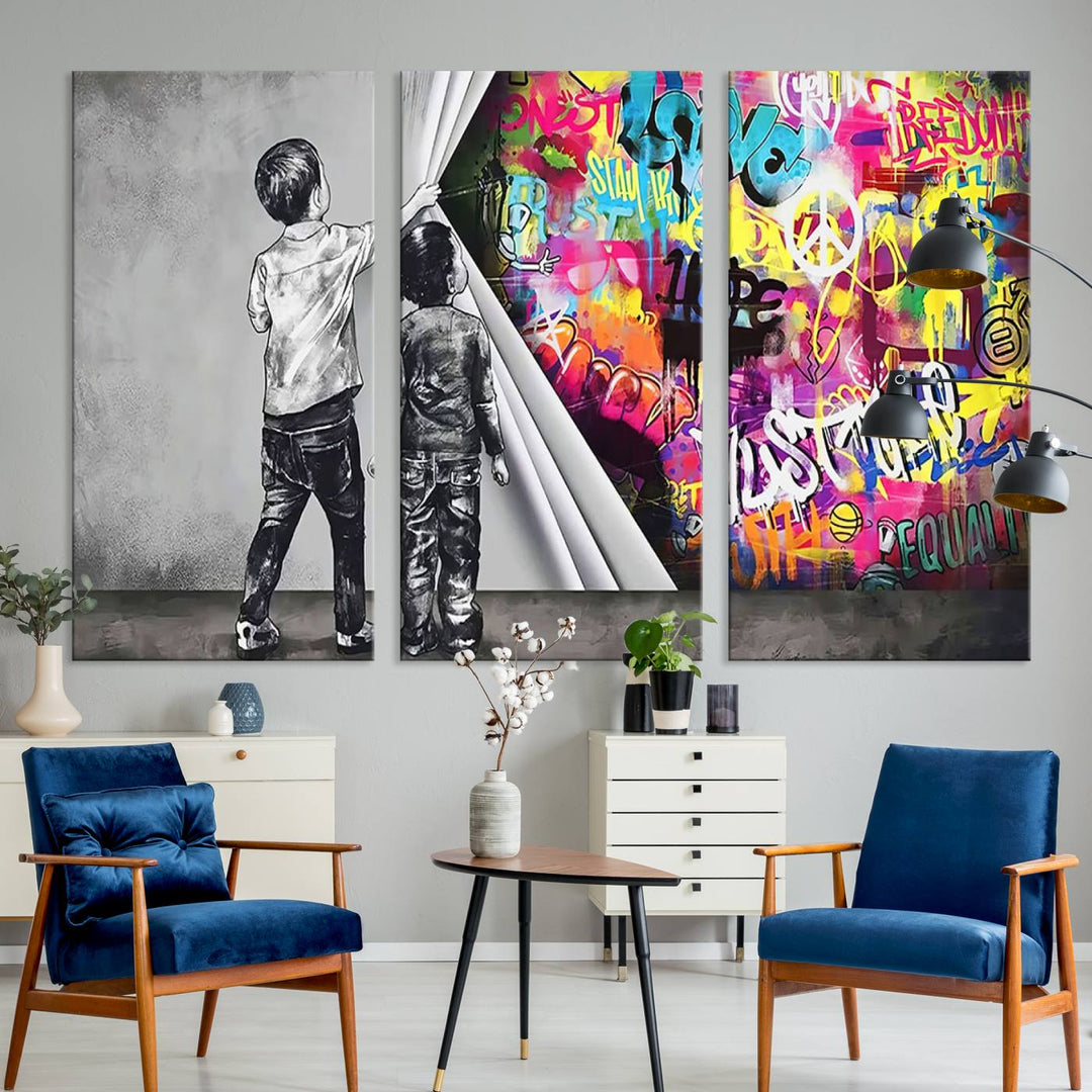 The Banksy Print - Street Art Canvas features a vibrant and bold image of two children lifting a curtain to reveal colorful graffiti. It's ready to hang, adding an urban modern decor vibe.