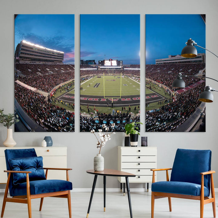 The wall art in the living room features a Texas Tech Red Raiders Football Team Print, showcasing Jones AT&T Stadium at dusk.