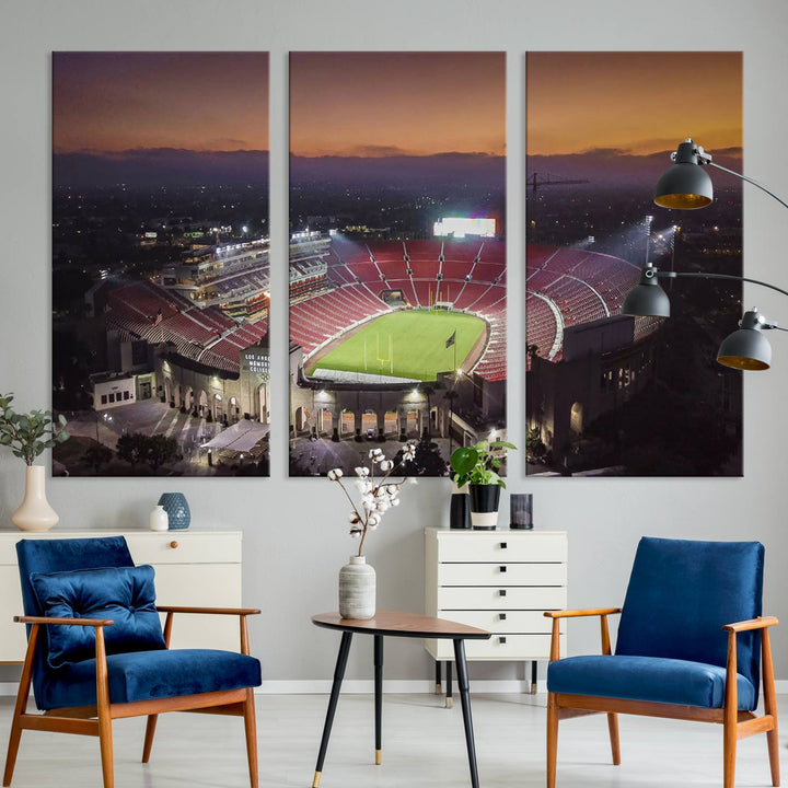 The USC Trojans Stadium canvas captures Memorial Coliseum at twilight, showcasing red seats and a green field beneath an orange sky.