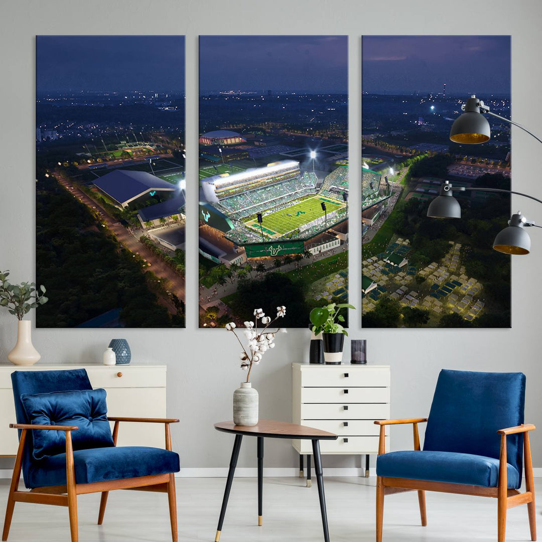 The USF Bulls Football Team Wall Art Canvas Print showcases the Tampa USF Football Stadium at night with city lights.