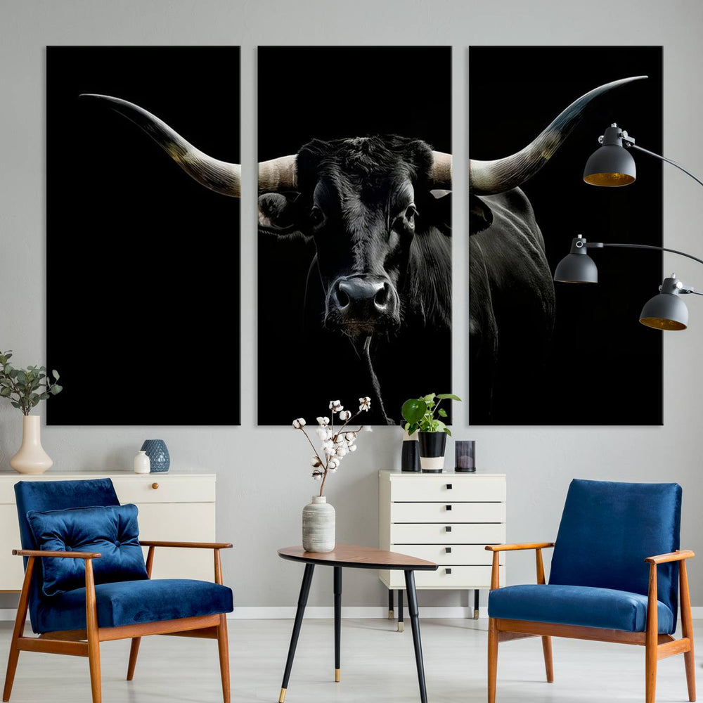 The Texas Black Longhorn Bull Canvas Print, featuring large curved horns set against a dark background, is ideal for Western decor.