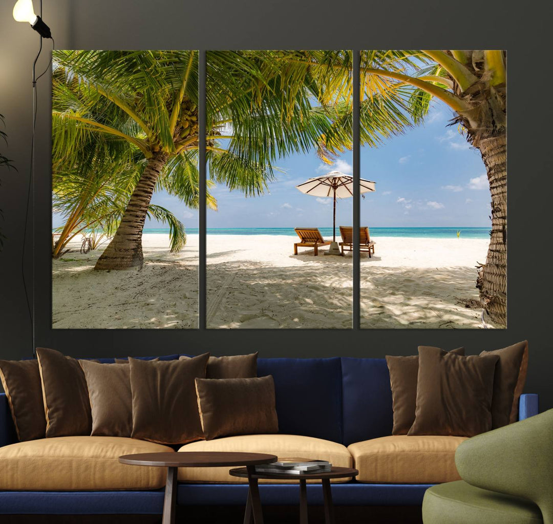 The canvas art print titled Lounge Chairs Palm Trees on Tropical Beach offers free shipping.