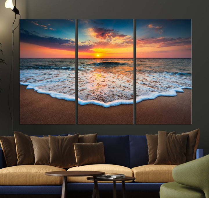 A Sunset with Calm Waves on the Beach Wall Art Canvas Print adorns the dining room.