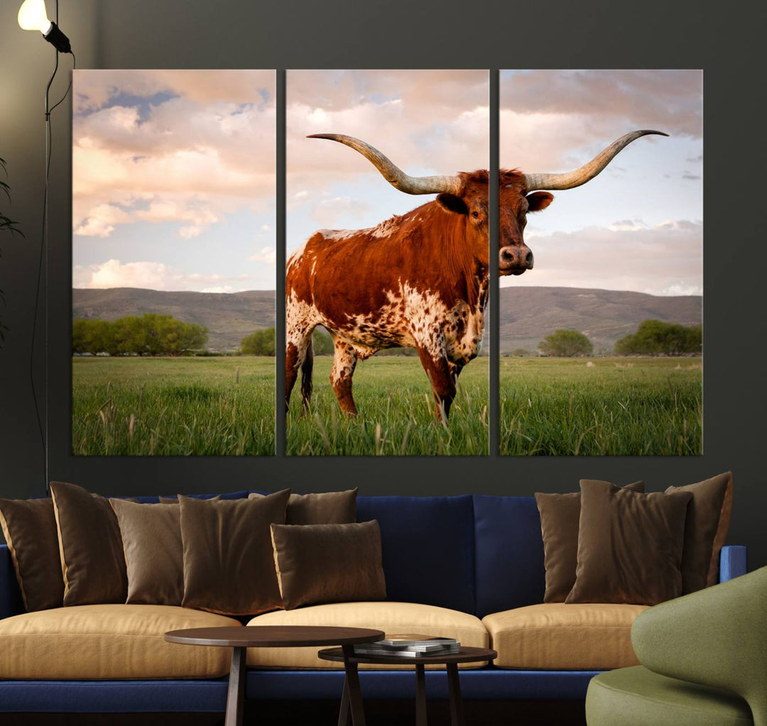 The Texas Cow Canvas Wall Art print captures a longhorn cow at sunset and is ready to hang.