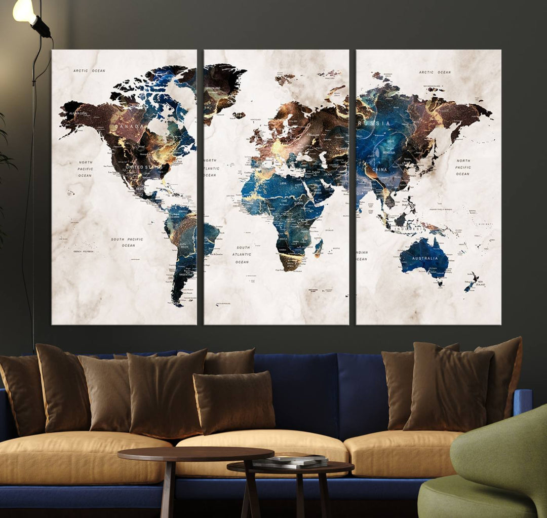 Abstract earth-toned 3-panel world map wall art featuring blues and browns, ready to hang; it showcases continents on modern canvas.