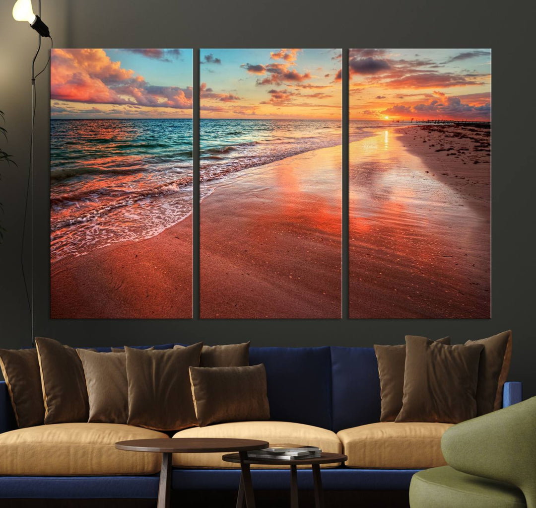 A Vibrant Sunset Beach Canvas Print with ocean waves and sandy shoreline enhances coastal-themed interiors.