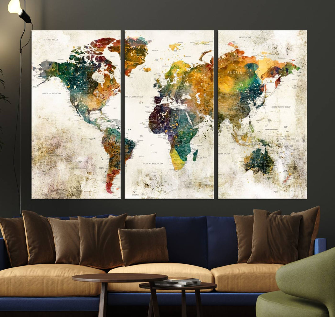 A 3-panel vintage world map canvas art is displayed.