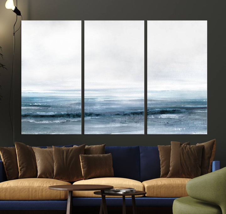 The dining area features Blue Ocean Abstract Artwork on canvas.