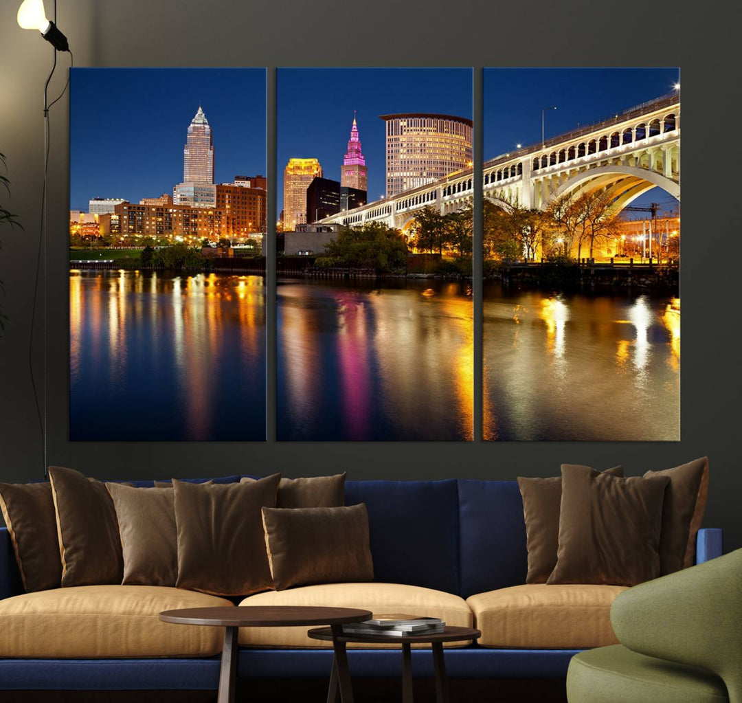 Cleveland Night Skyline Canvas: Cityscape with an illuminated bridge reflecting on calm water.