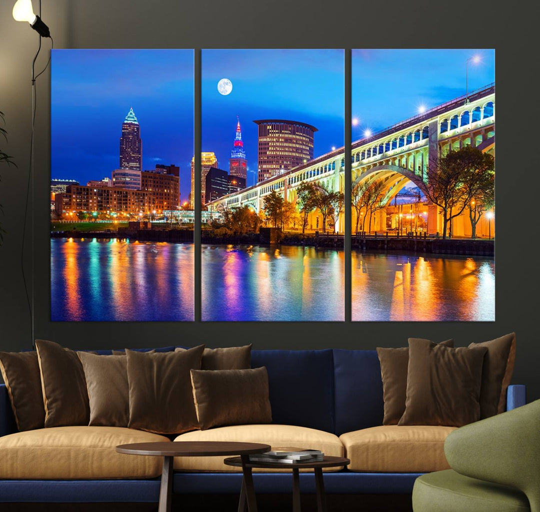 A Cleveland Night Skyline Wall Art on museum-quality canvas showcases a bridge and illuminated buildings.