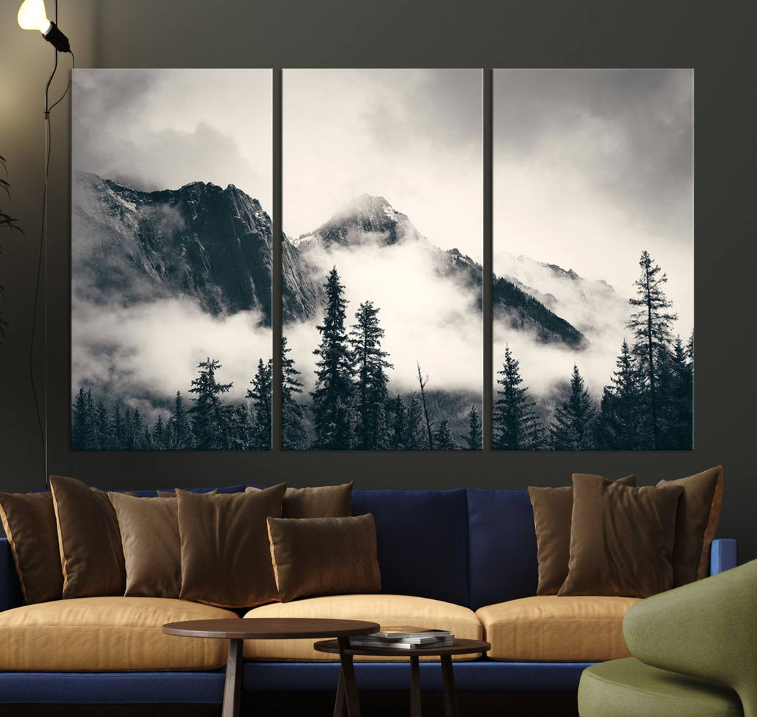 A large foggy mountain forest canvas print hangs prominently in the room.