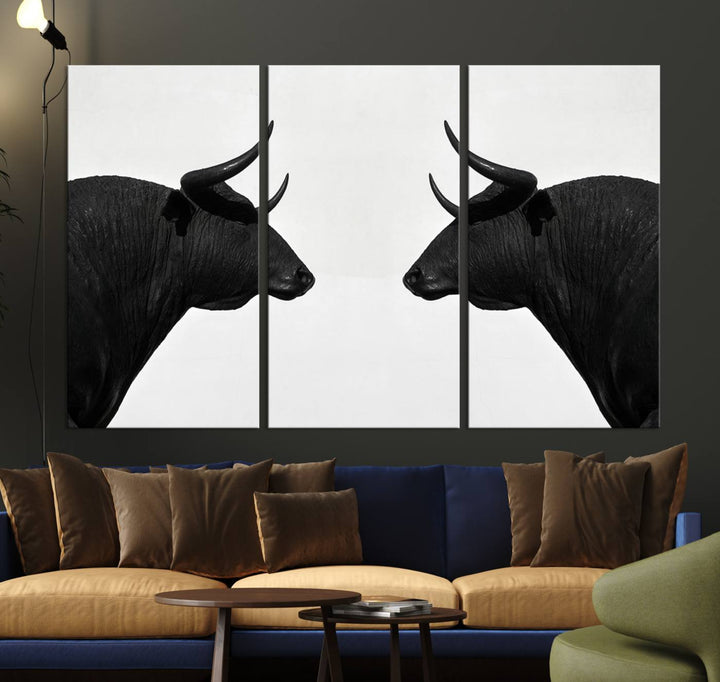 Spanish Bull Wall Art Canvas Print: Two black bull heads facing off on museum-quality canvas.