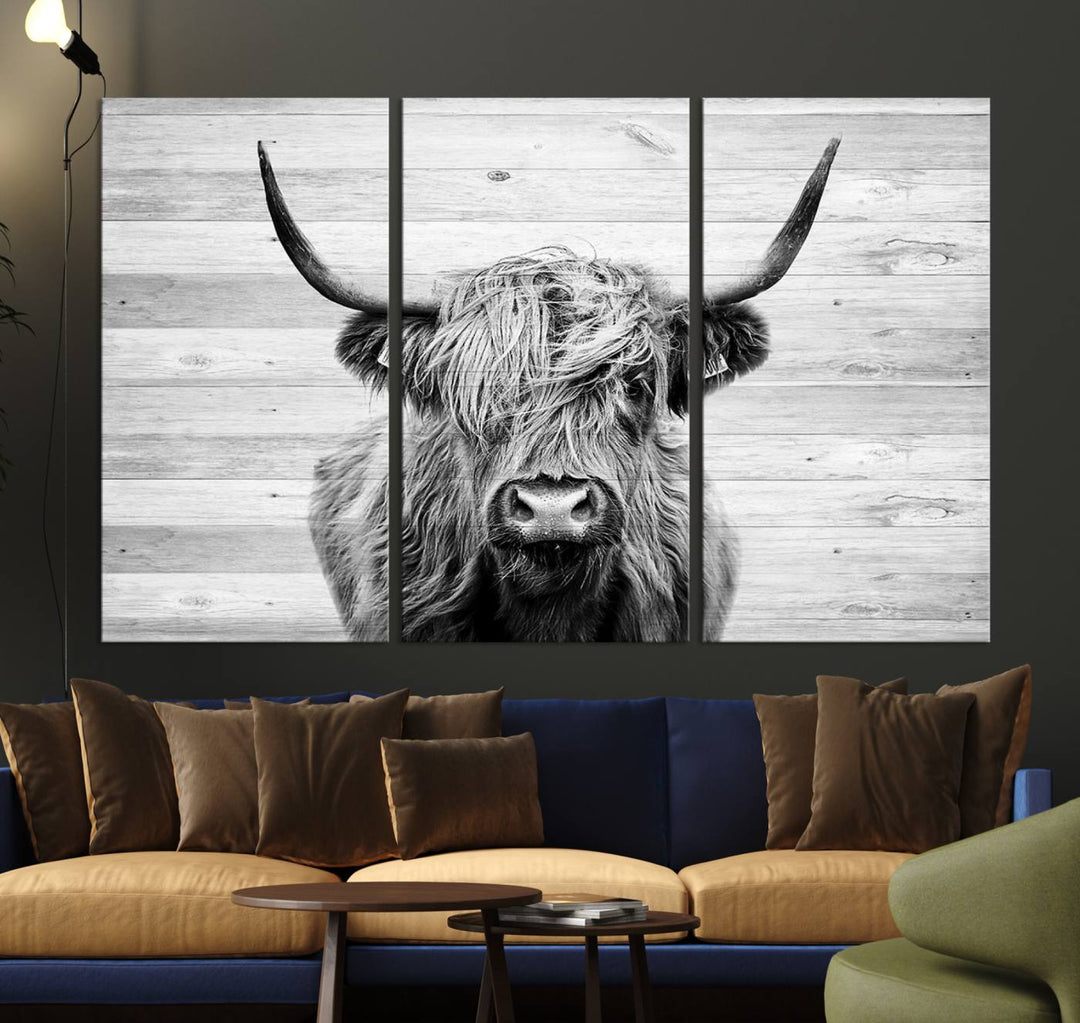 Scottish Highland Cow Cattle Art adds rustic farmhouse charm to the space.