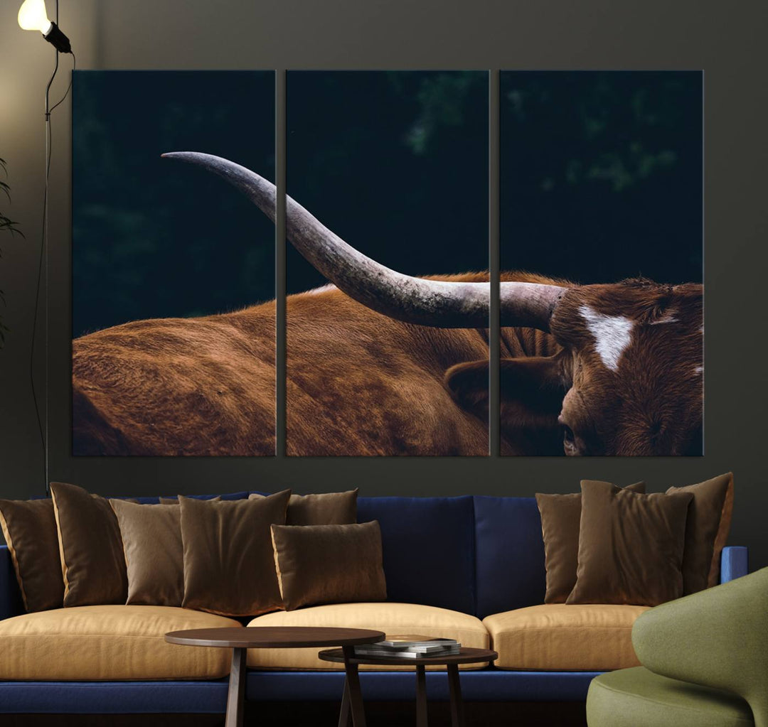 The kitchen dining area features a Texas Longhorn Bull wall art.