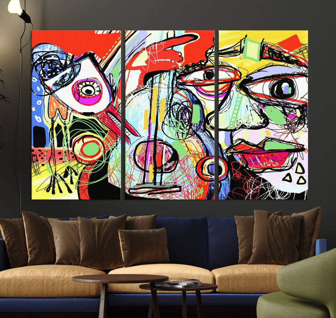 A Picasso-style abstract canvas with vibrant colors and a distorted face enhances the space.