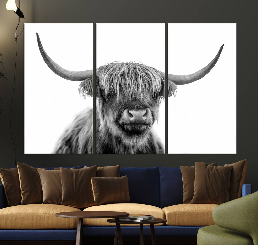 A Scottish Highland Cow Art Canvas adds charm to the farmhouse decor.