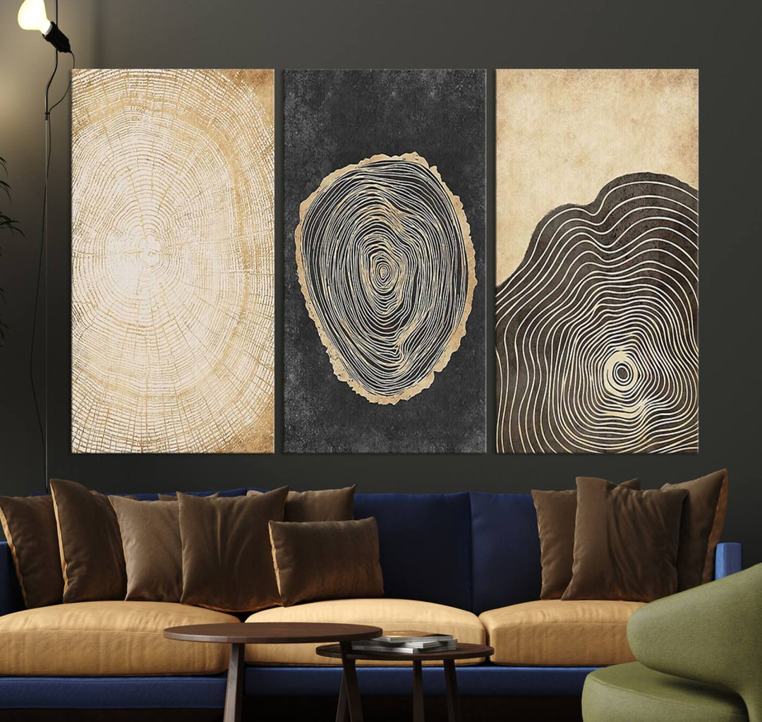 Tree Rings Canvas Wall Art Print hangs prominently in a modern kitchen.