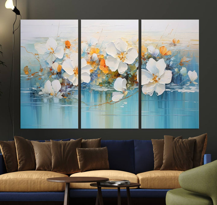 An Abstract Flower Wall Art Canvas Print in blue and orange hues.