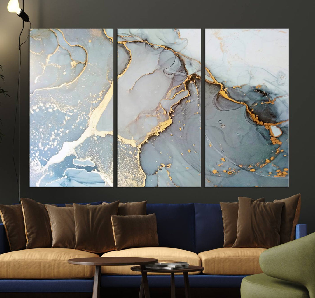 A blue and gold marbled Large Abstract Marble Wall Art Canvas Print hangs overhead.