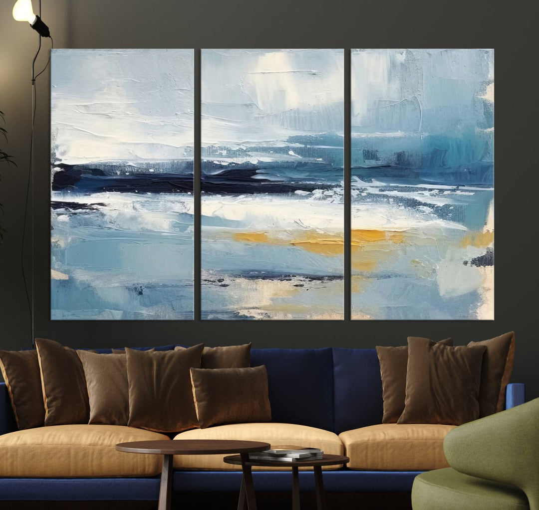 The Abstract Ocean Canvas Wall Art in coastal blue and gold enhances the modern kitchen.