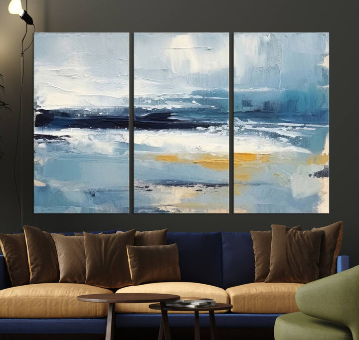 The Abstract Ocean Canvas Wall Art in coastal blue and gold enhances the modern kitchen.