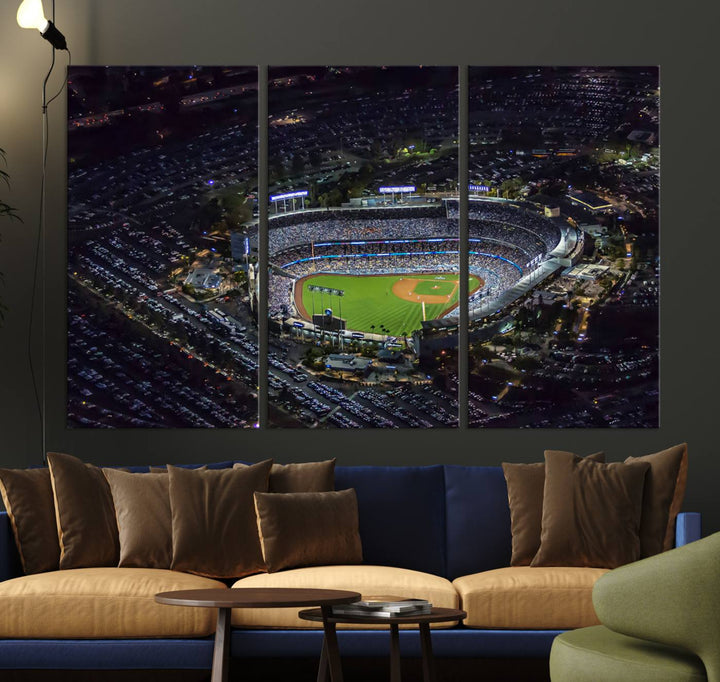 A large Los Angeles Dodgers print of Dodger Stadium at night is displayed near a window.