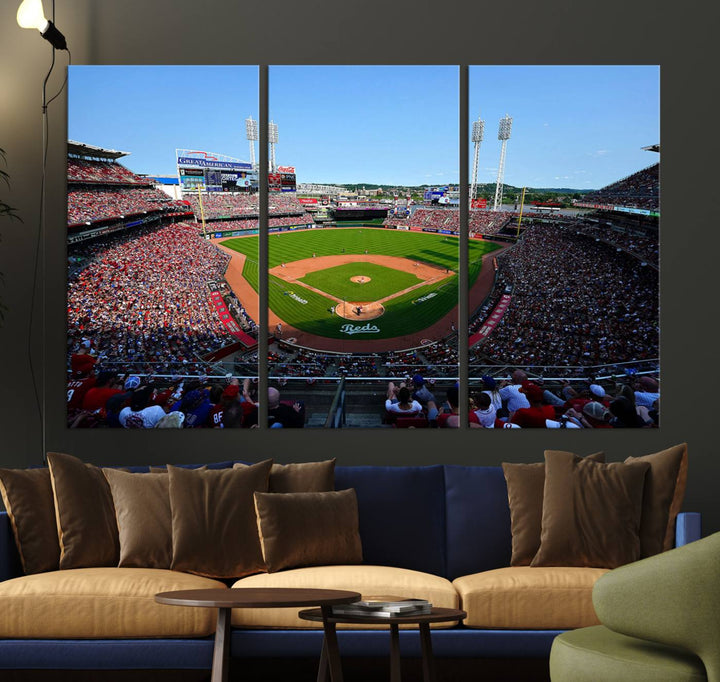 The Cincinnati Reds Baseball Team print of Great American Ball Park Stadium adorns the wall.