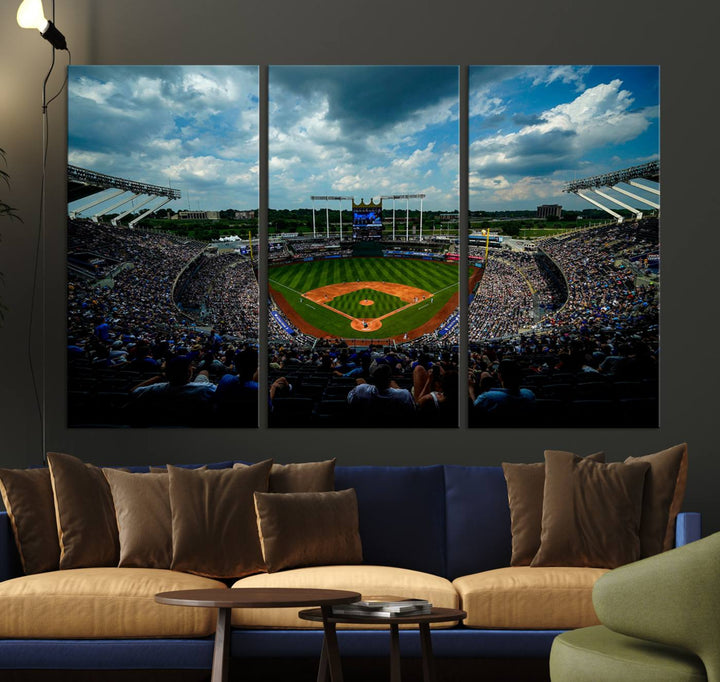 A 3-panel print of Kauffman Stadium, showcasing a crowded baseball field under cloudy skies.