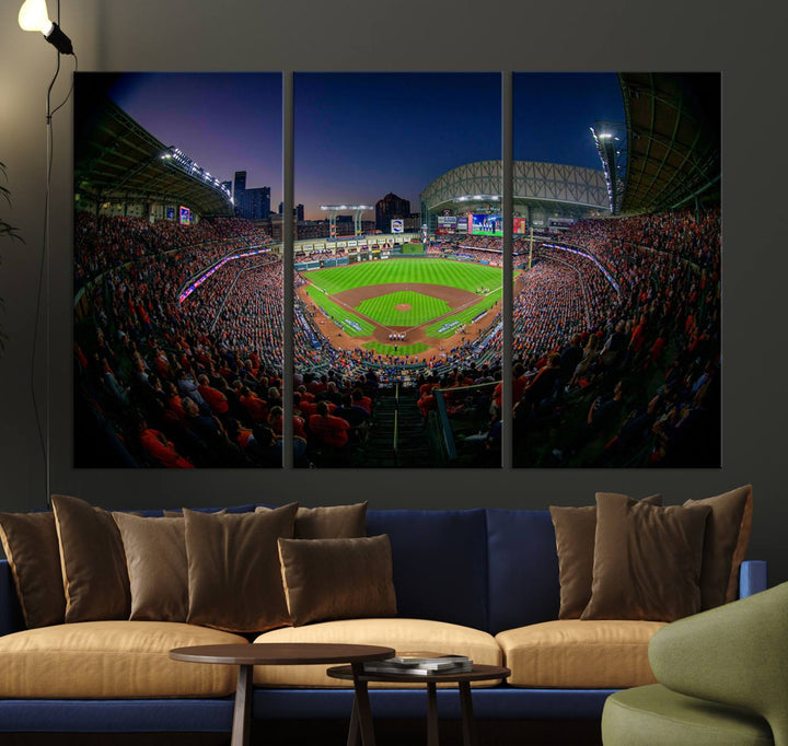 A canvas print of Houston Minute Maid Park at dusk is mounted on the wall.