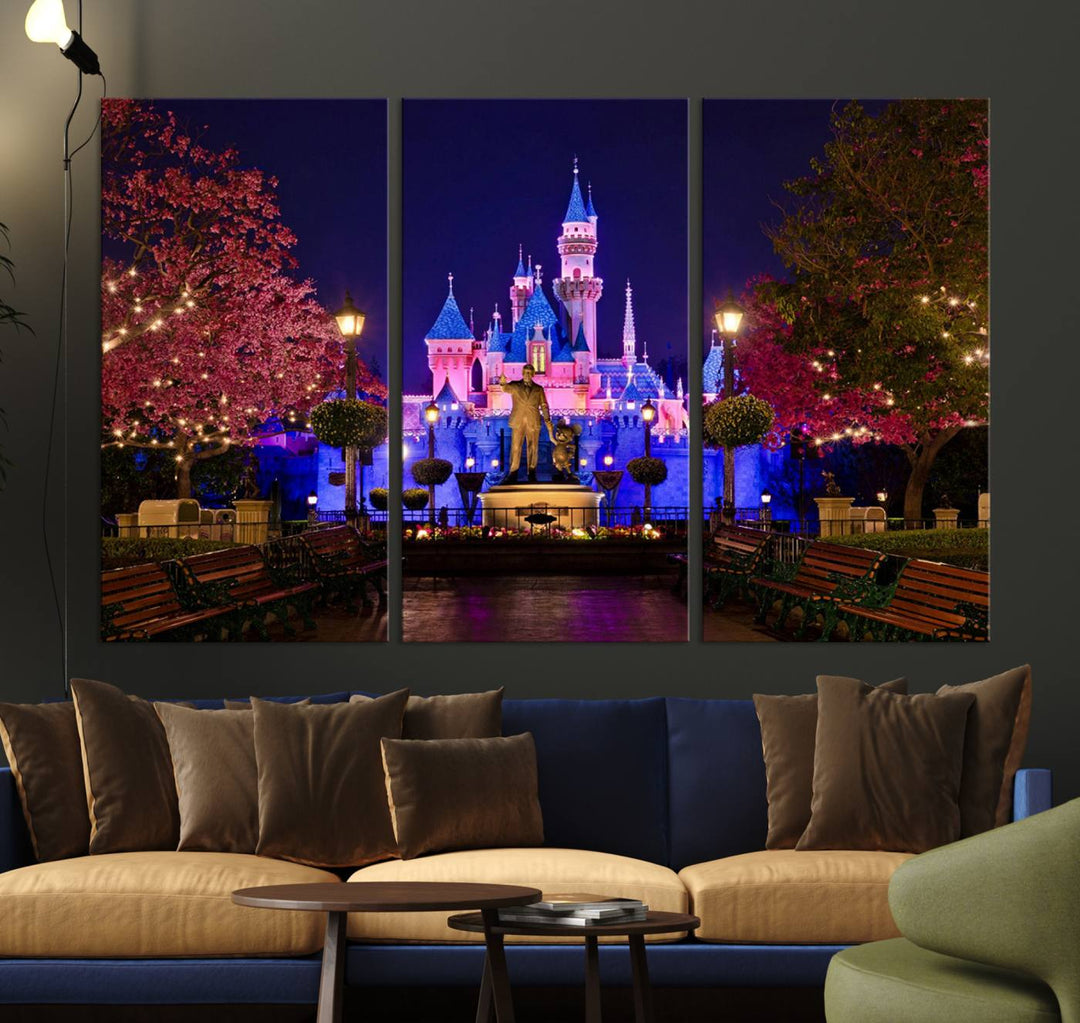 The Castle Large Wall Art is surrounded by illuminated trees at night.