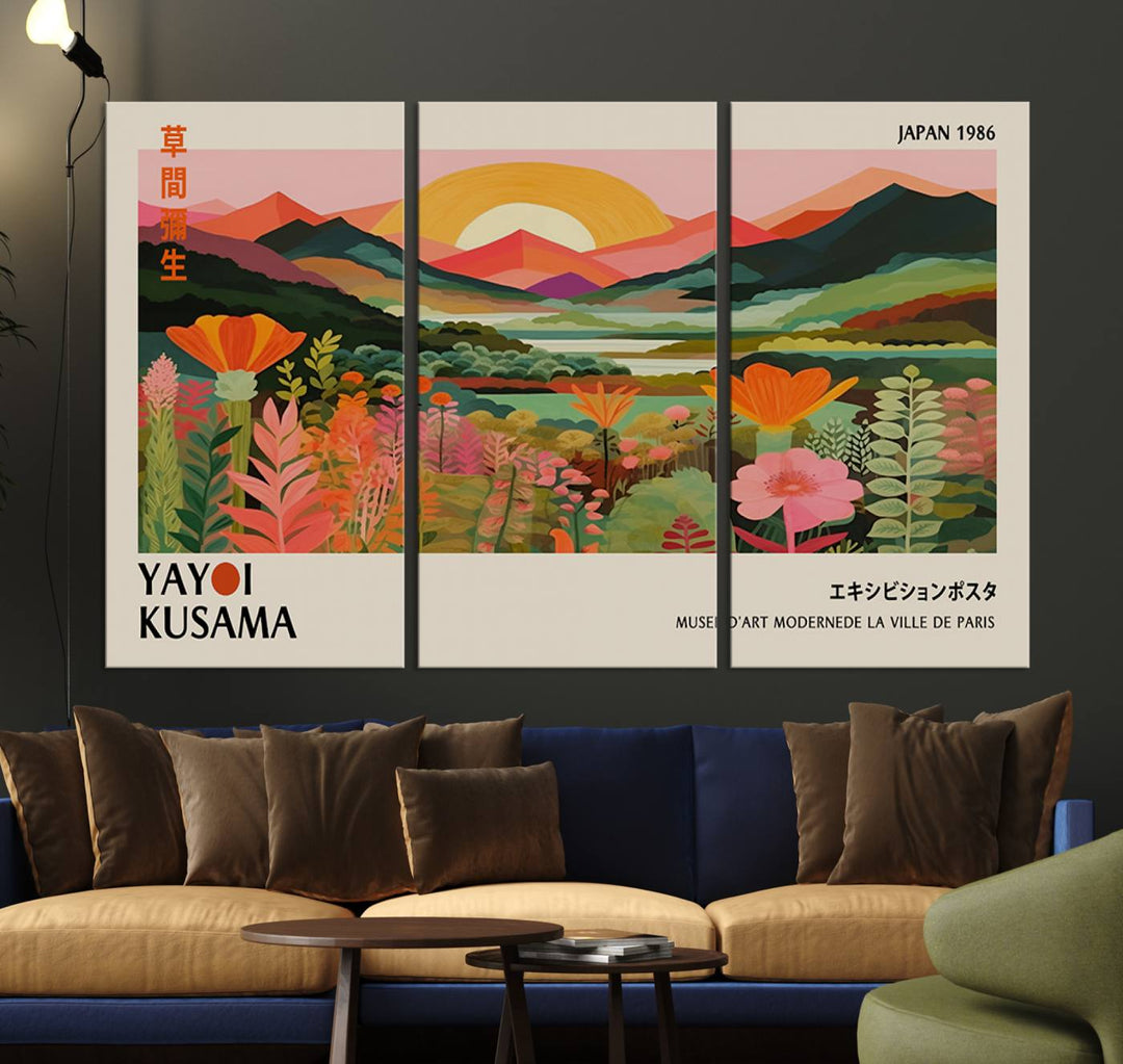 The Yayoi Kusama Landscape Canvas Print, featuring vibrant floral mountains and sunset scenery, enhances the room.