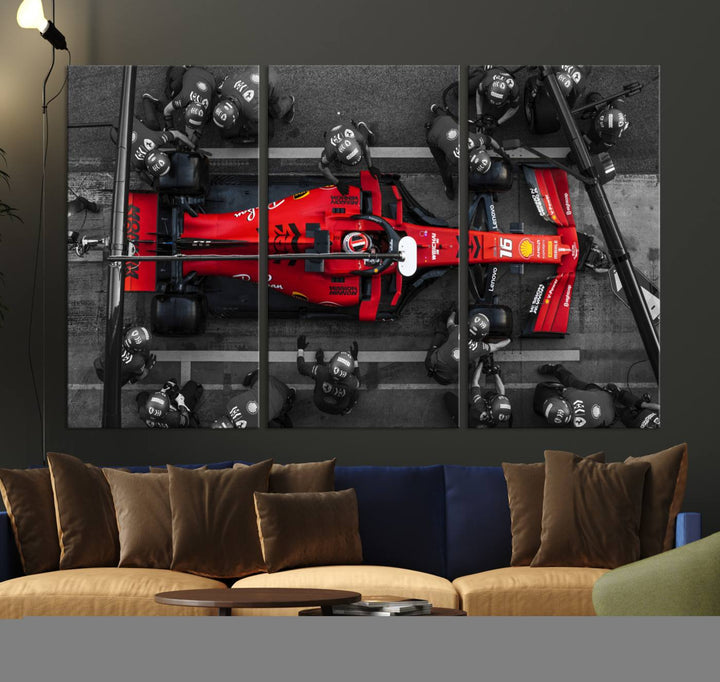 The Ferrari Pit Stop Canvas Wall Art features bold motorsport imagery that captures the precision and speed of Formula 1.