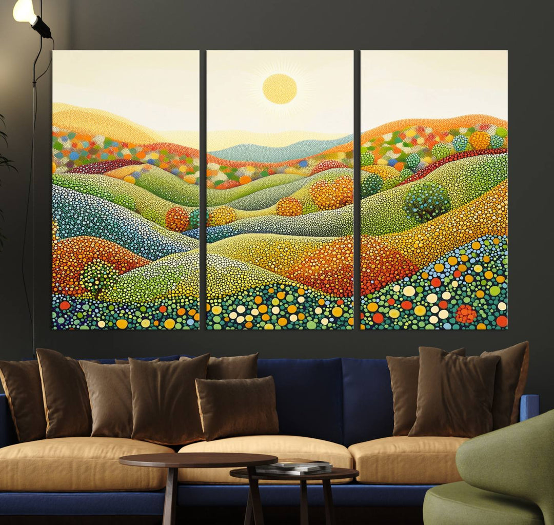 The YAYOI KUSAMA Colorful Dot Art Landscape Canvas, a framed abstract pointillism piece inspired by nature featuring vibrant rolling hills and a sun, adds gallery-quality elegance to your living space.