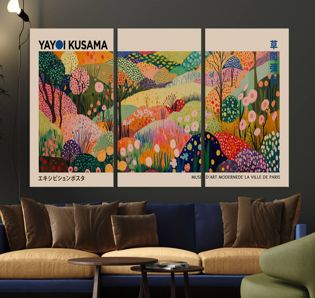 A Yayoi Kusama Wall Art Canvas Print featuring vibrant abstract floral patterns is displayed in a tranquil forest setting.