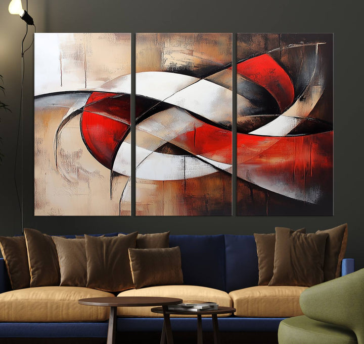 In a contemporary living room, the sunlight casts artistic shadows and highlights an abstract triptych wall art featuring bold red and white geometric shapes.