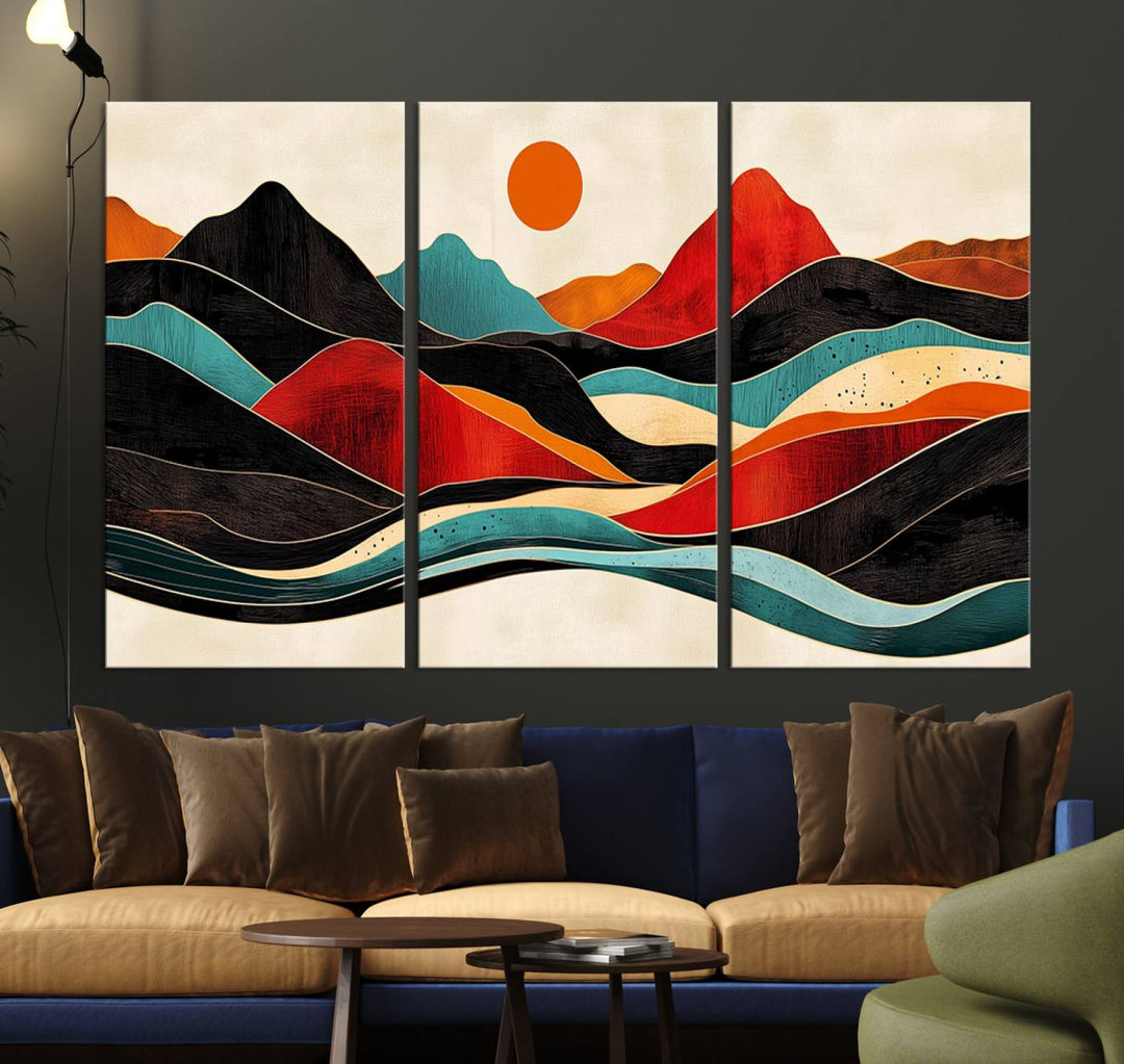 The Colorful Western Triptych Canvas features a vibrant mountain and sun design, making it perfect for modern kitchens or log cabin walls.